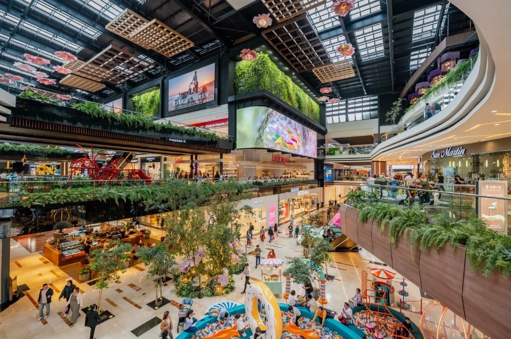 Modern shopping mall interior with multi-level retail spaces